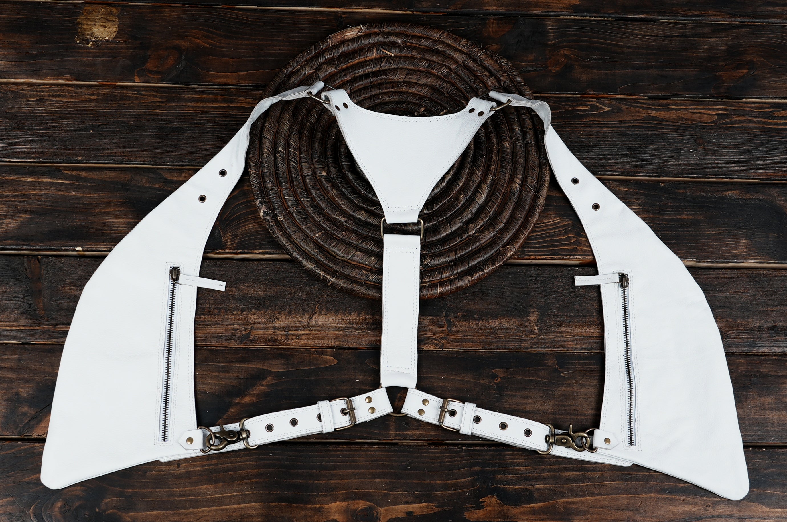 White leather shoulder holster with zippered utility pouches