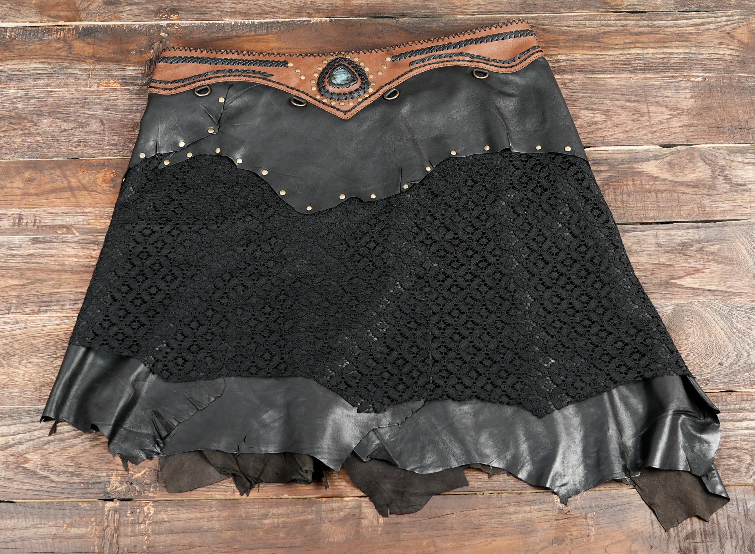 Black leather lace skirt for festival outfits.