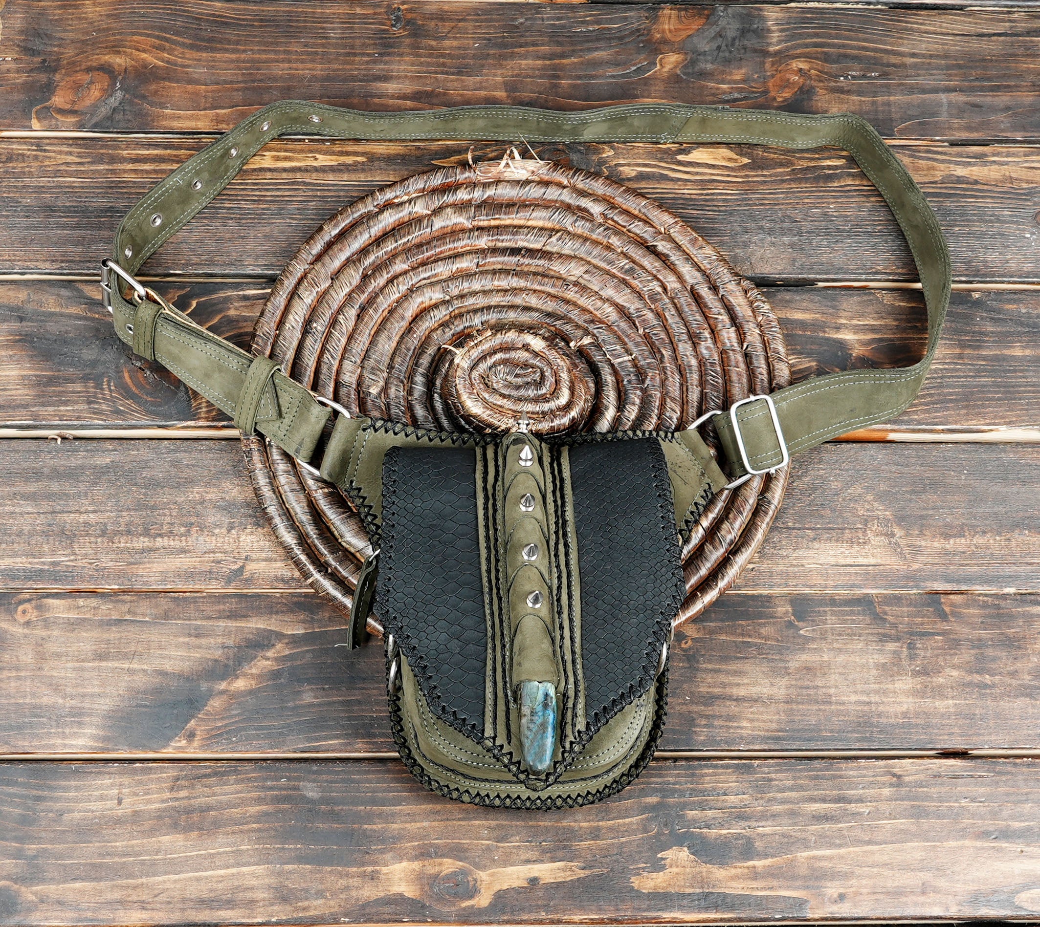 Black leather waist belt with artisan-crafted details