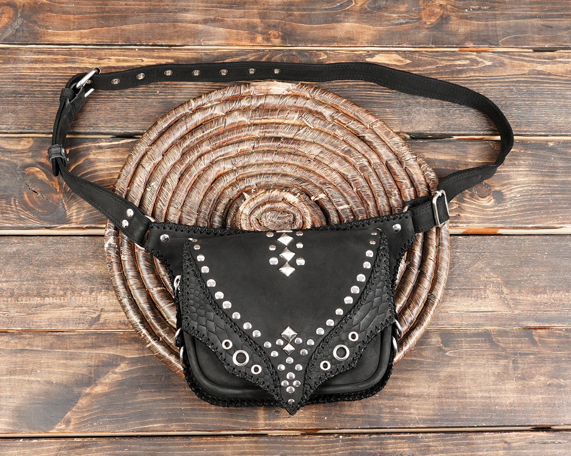 Embellished leather hip pouch with secure closure