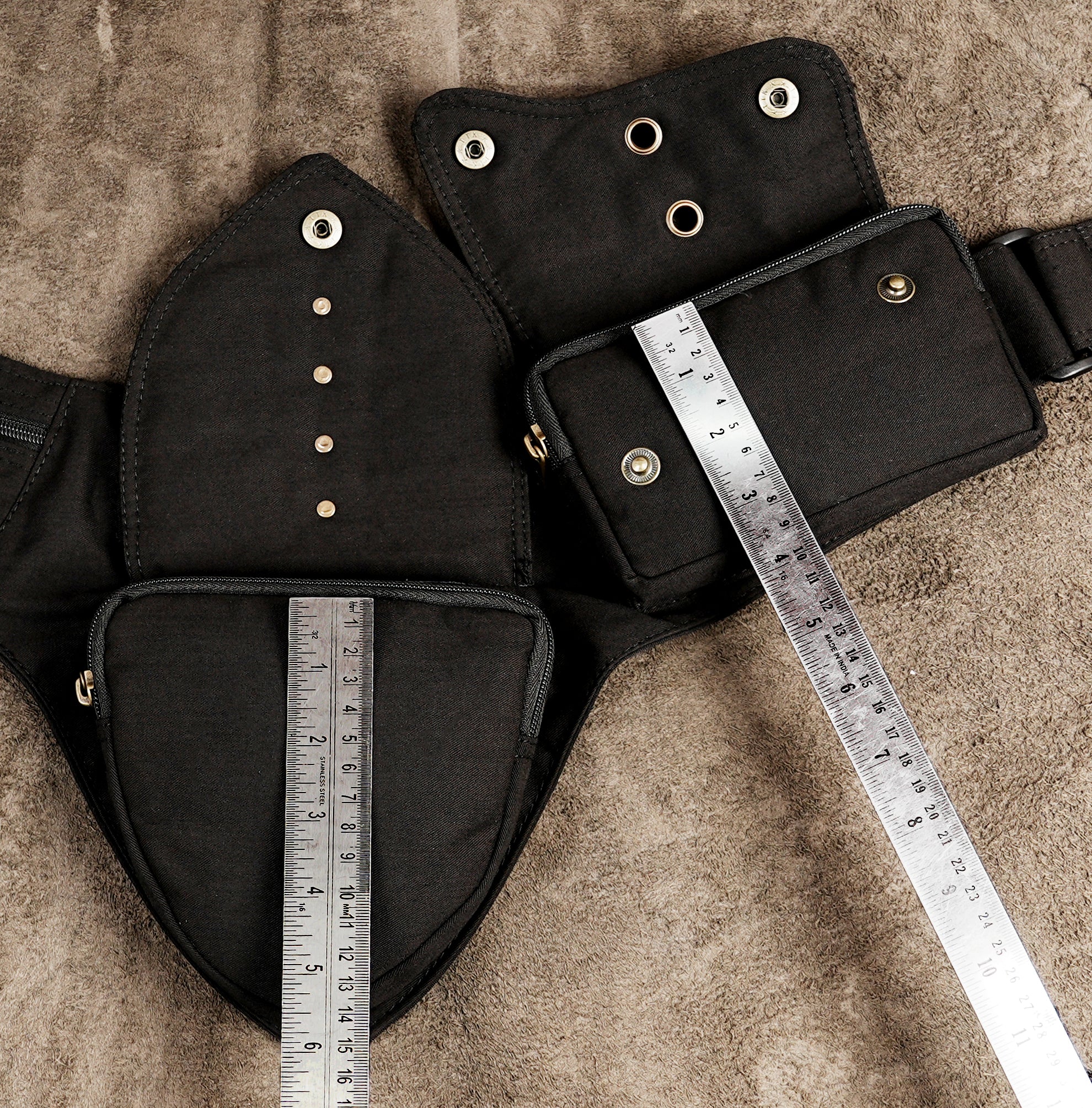Black cotton bum bag with adjustable buckle belt and zip compartments