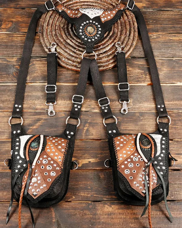 Handmade western leather holster bag with gemstone detail on wooden background