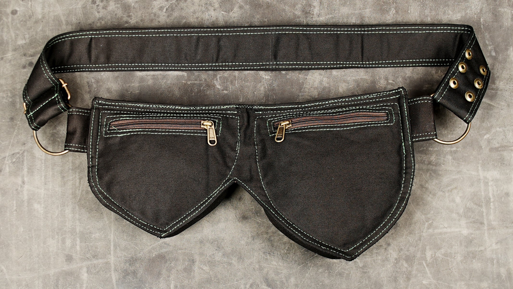Black cotton rave belt with double pouches, green spider web stitch and zip pockets