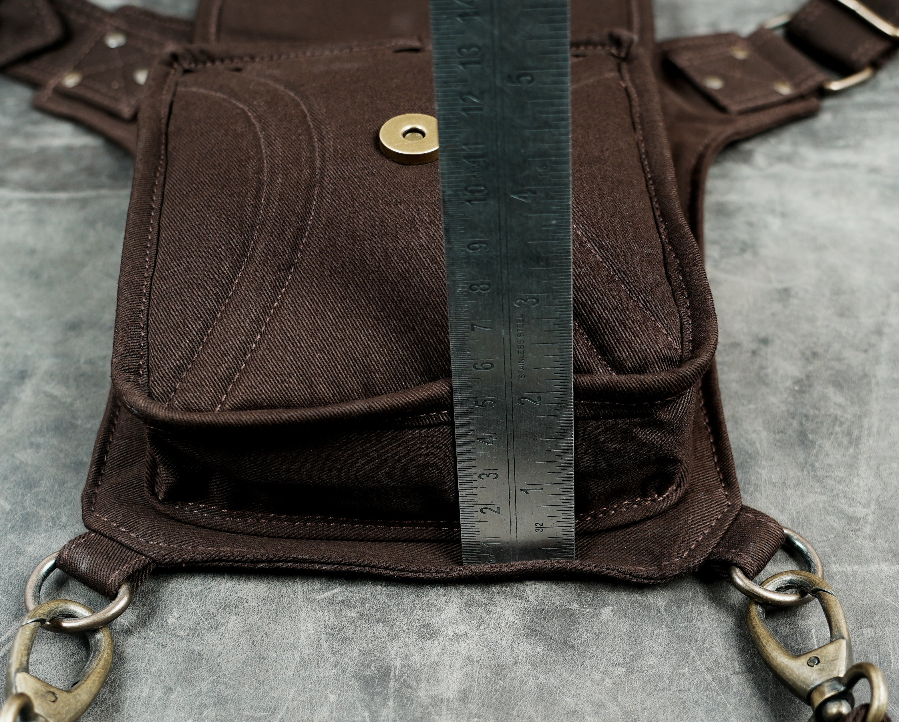 Brown boho thigh pouch with zipper pockets and waist strap