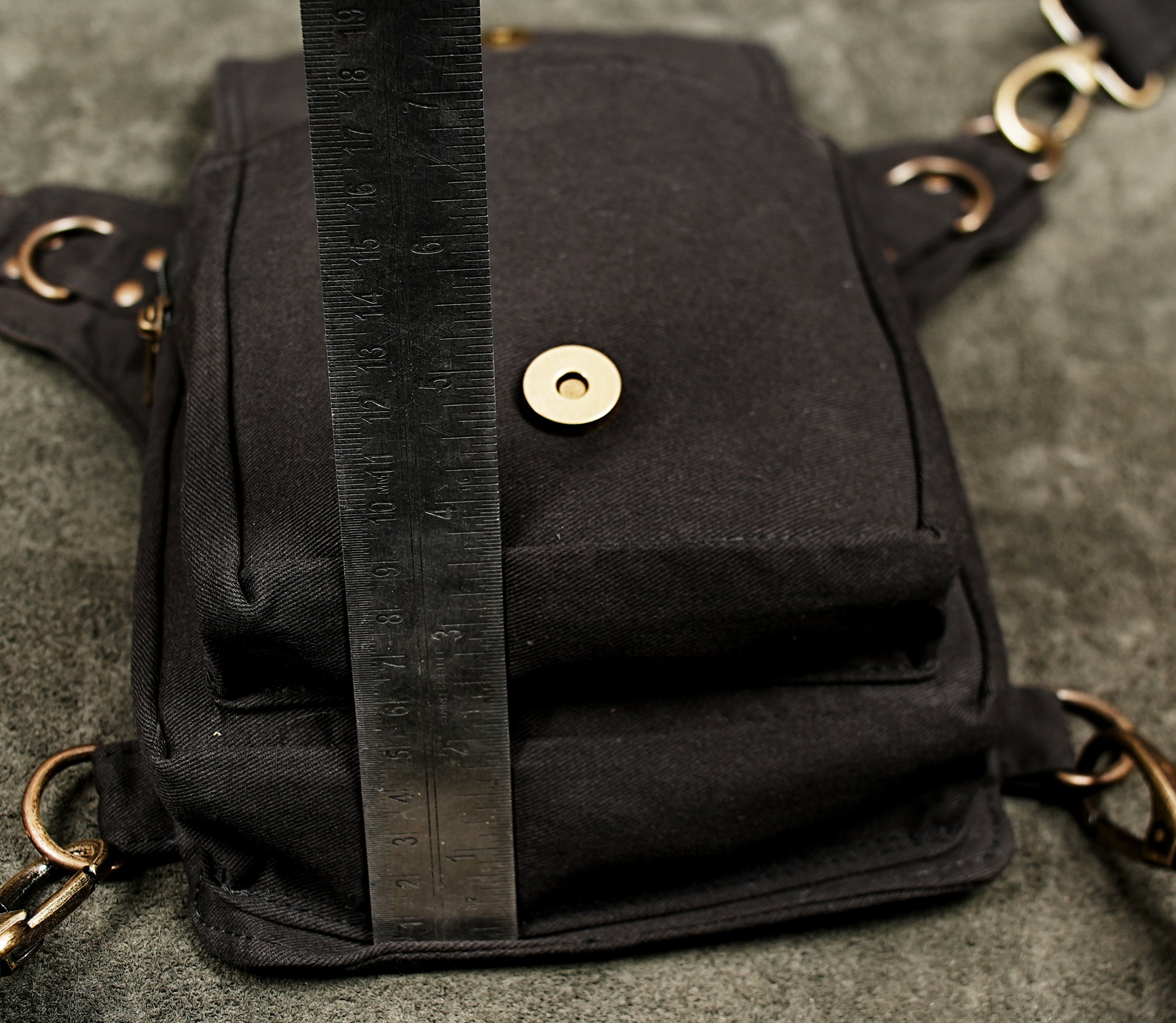 Handmade black cotton hip bag with ring ladder design