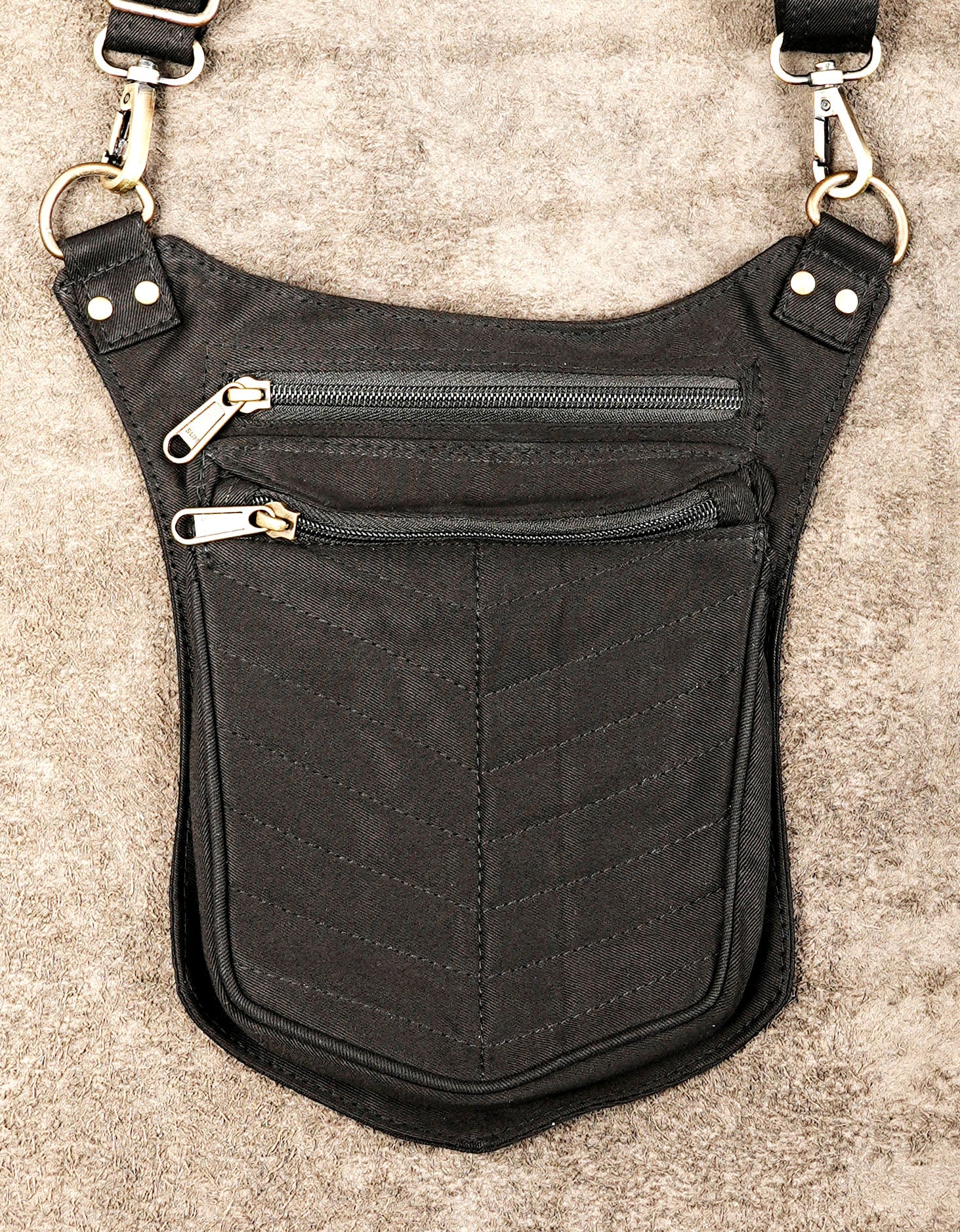 Steampunk style chest harness with adjustable shoulder straps and zip pockets