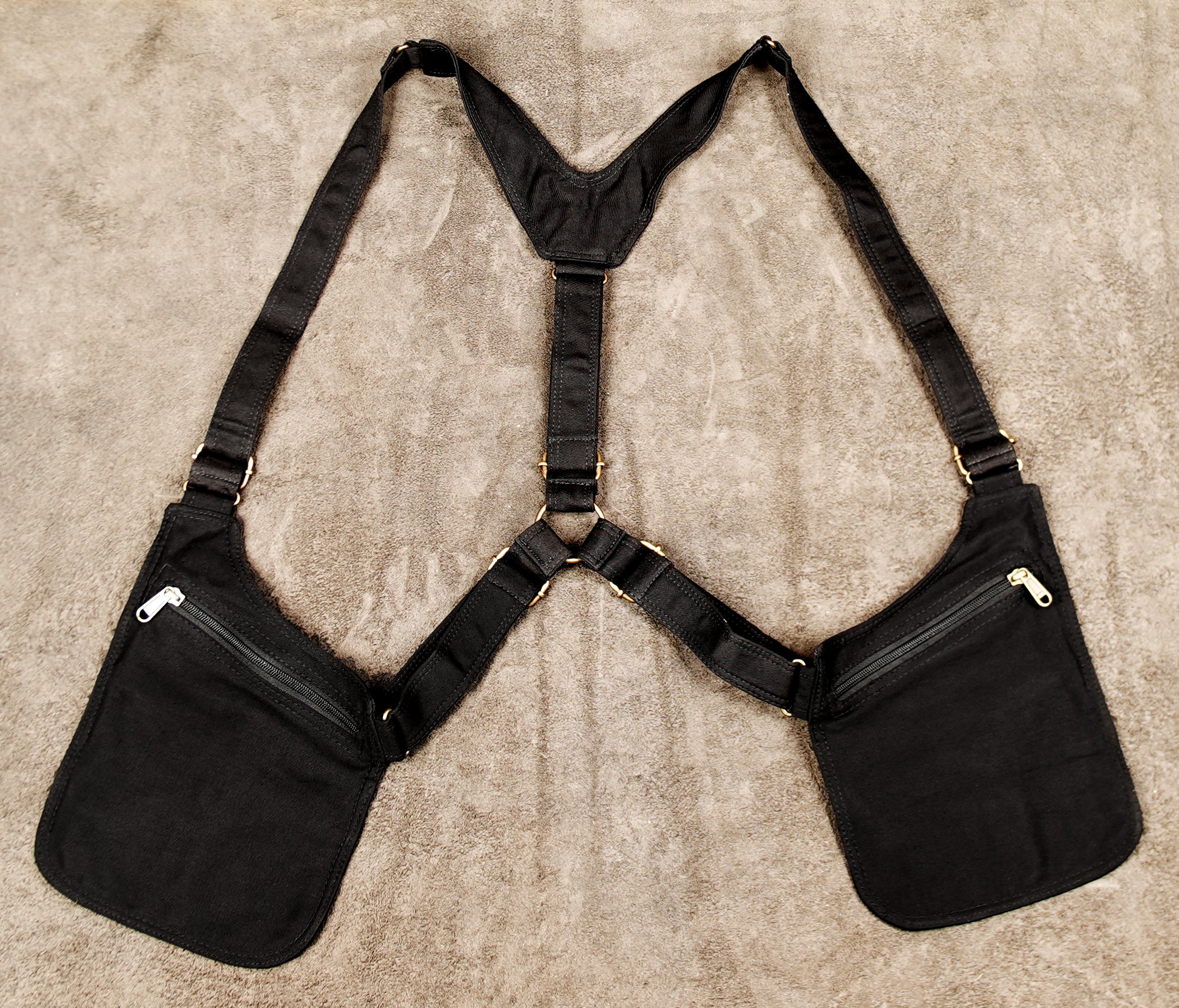 Black cotton cross-body holster with O-ring back strap design