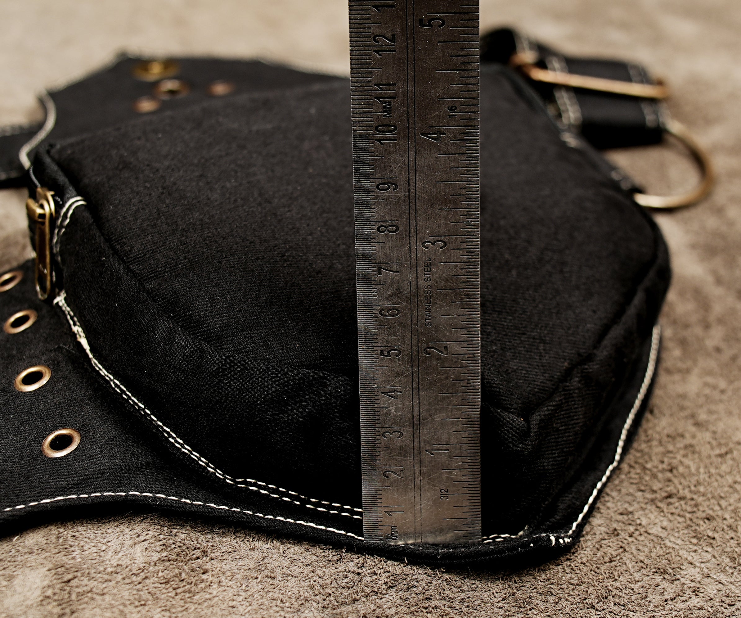 Tribal style black utility belt with two curved pouch pockets
