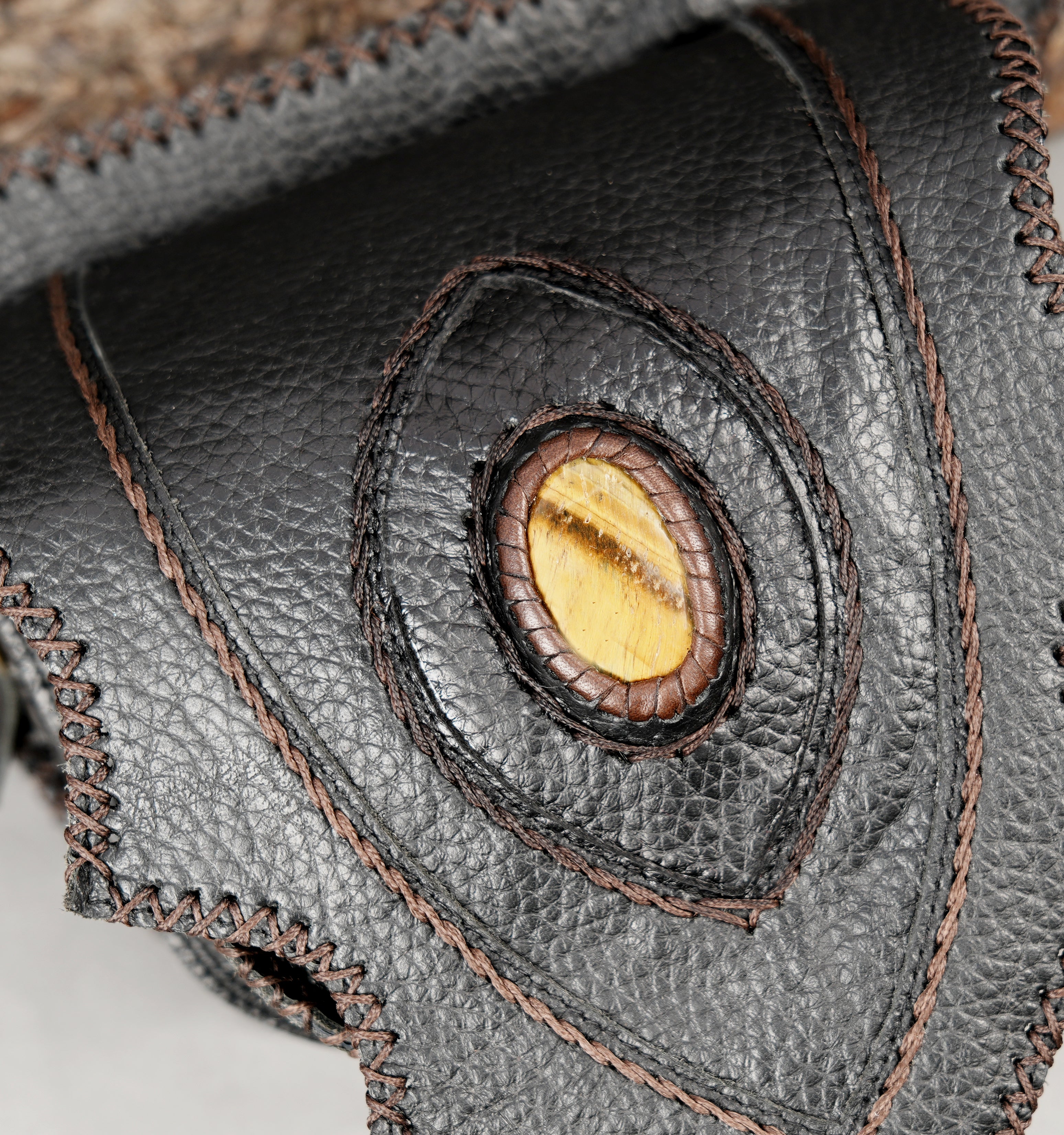 Handmade black leather waist bag with decorative gemstone