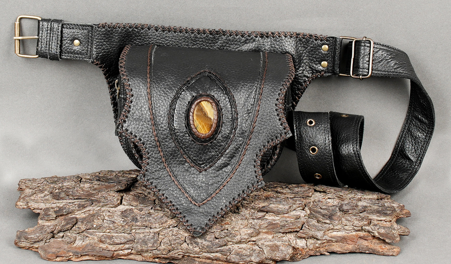 Black artisan waist bag with gemstone and reinforced hardware