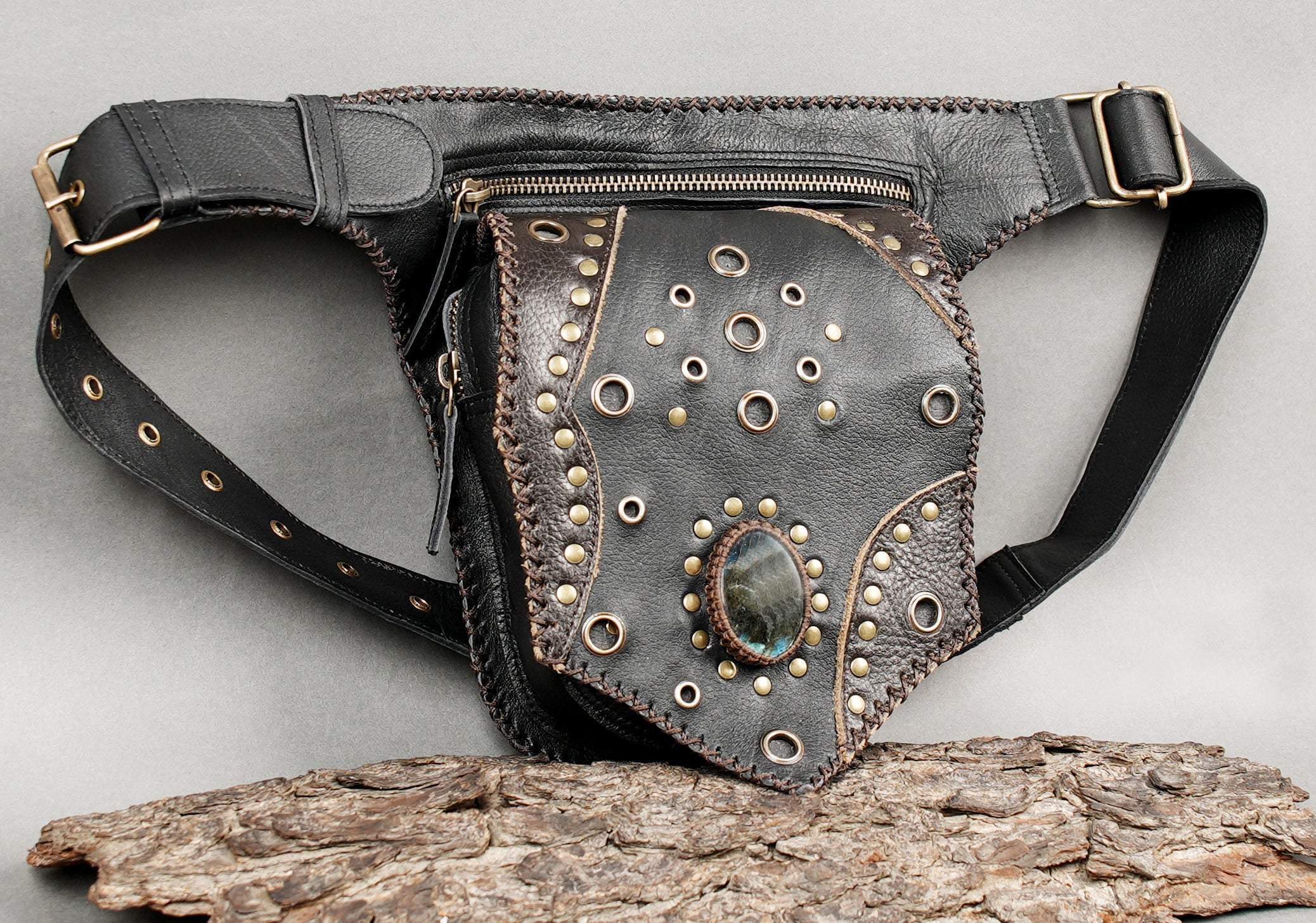 Leather waist belt with zipper pocket and studded craftsmanship