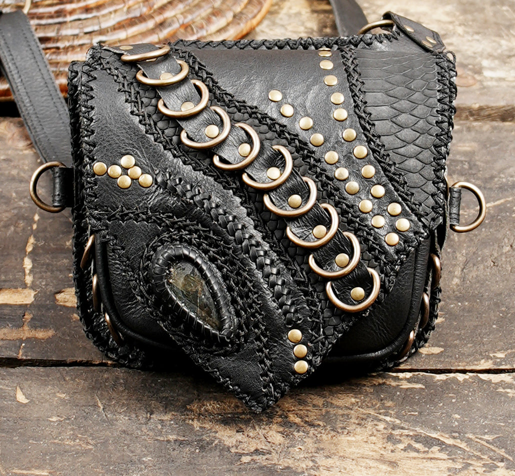 Adjustable leather shoulder holster with artisan craftsmanship