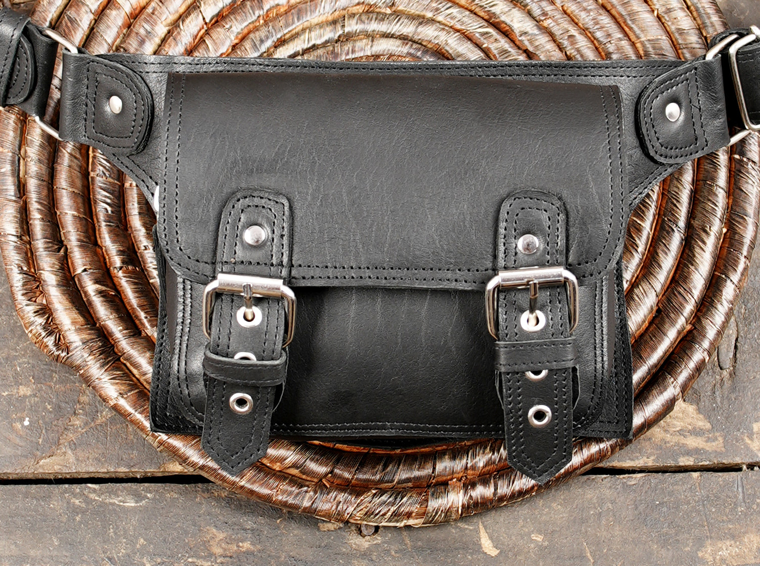 Leather waist belt bag with front flap pocket and buckles