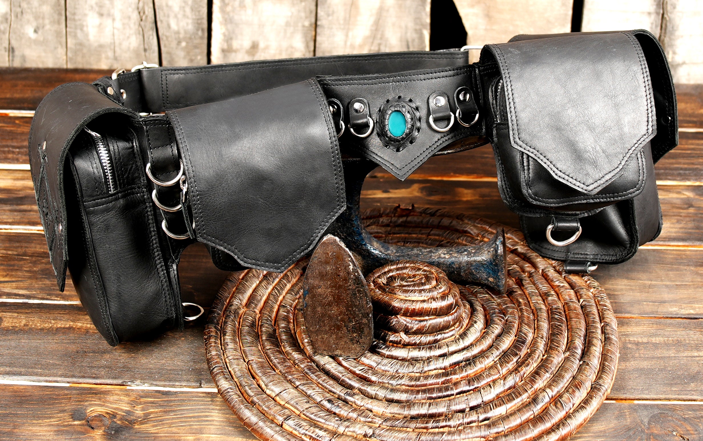 Handmade leather waist pack with turquoise stone accent