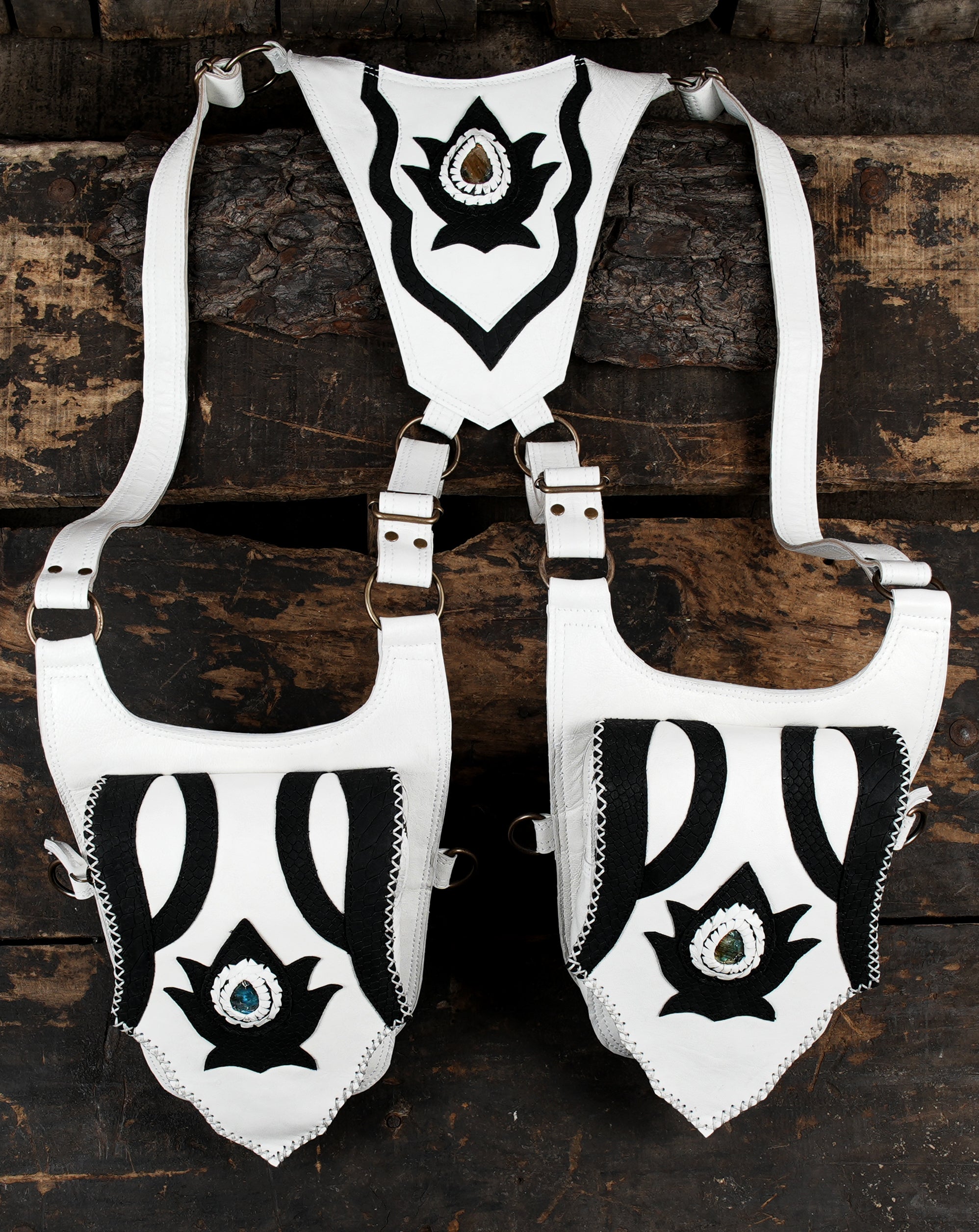 “White festival holster with tribal styling and gemstone focal point”