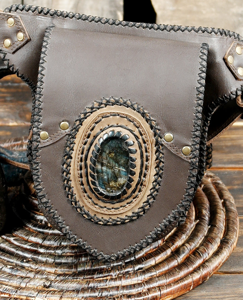 Adjustable leather waist belt with gemstone detail