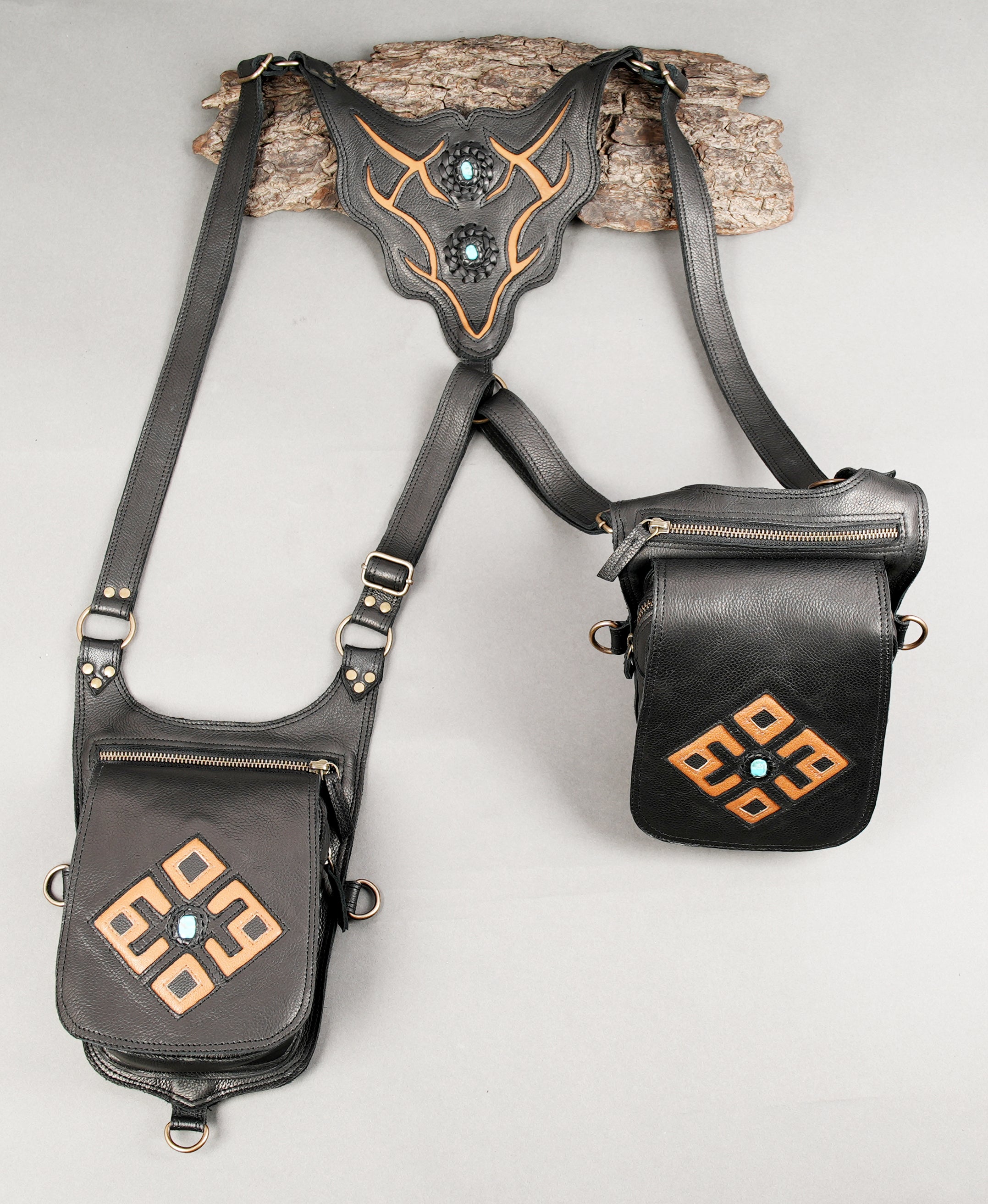 Handmade black leather utility belt with dual storage pouches.