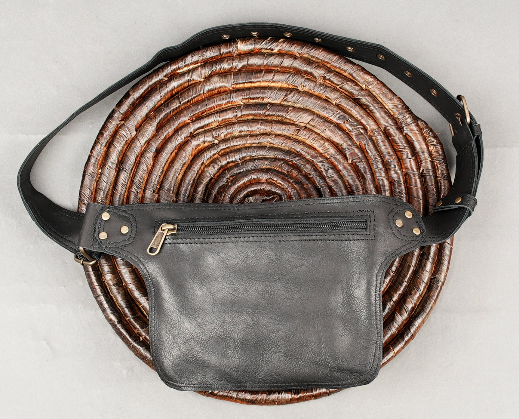 Adjustable black leather pouch belt for hands-free use