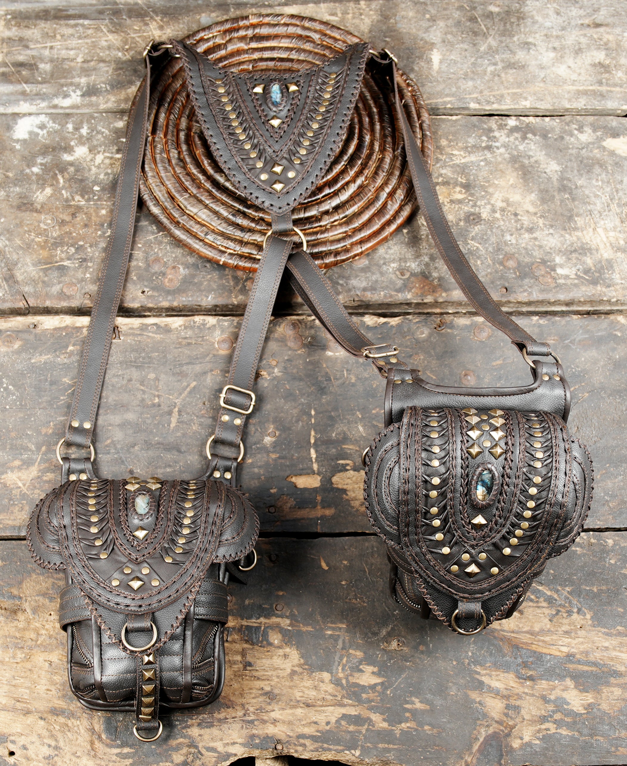 “Decorative brown leather holster with dual pockets and gemstone centerpiece”