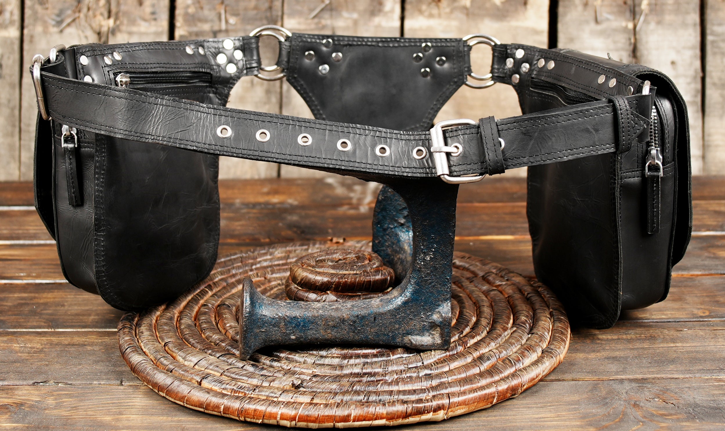 Black leather waist belt with multi pouch storage