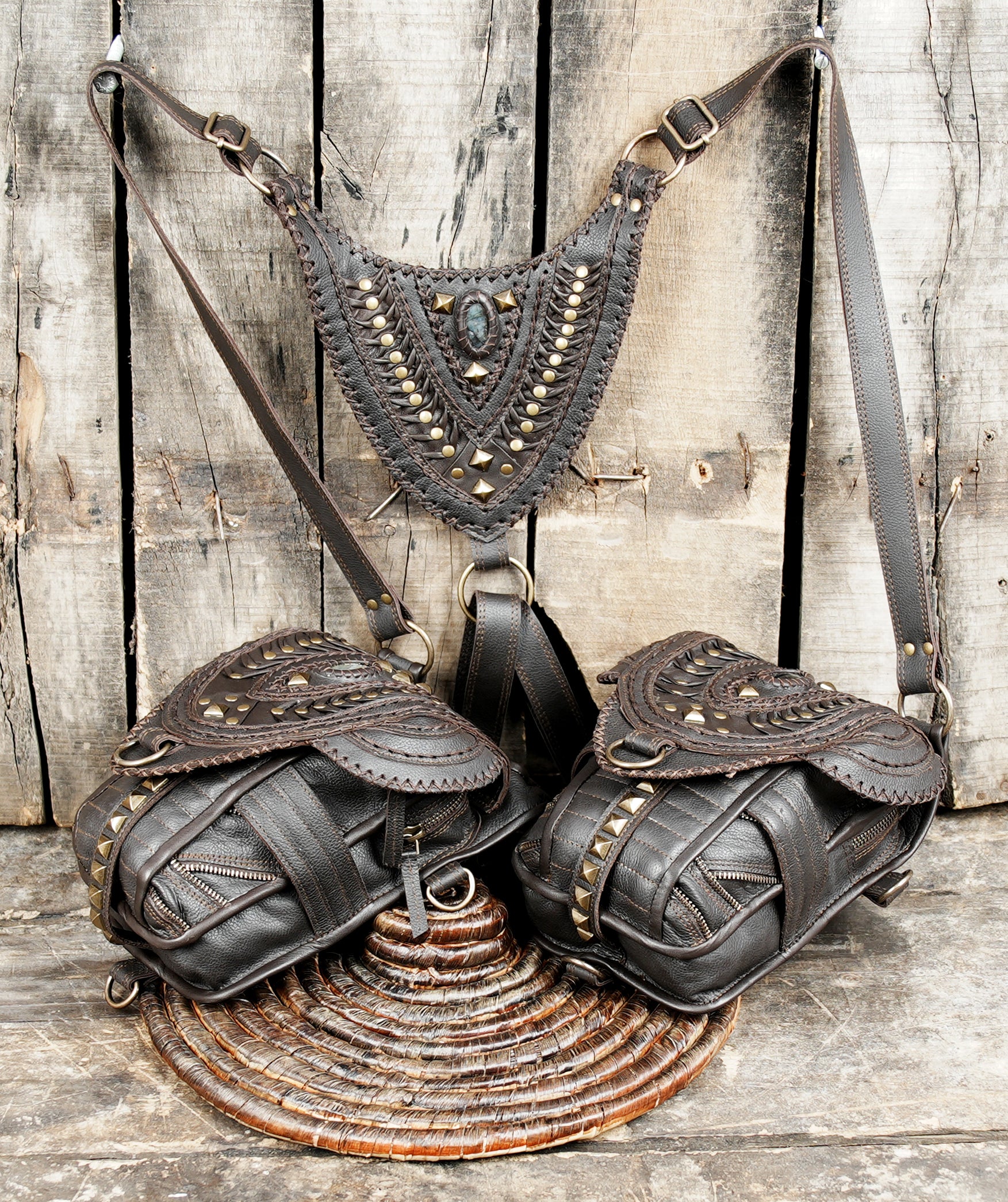 “Festival-ready tribal leather holster with stone accents and detailed stitching”