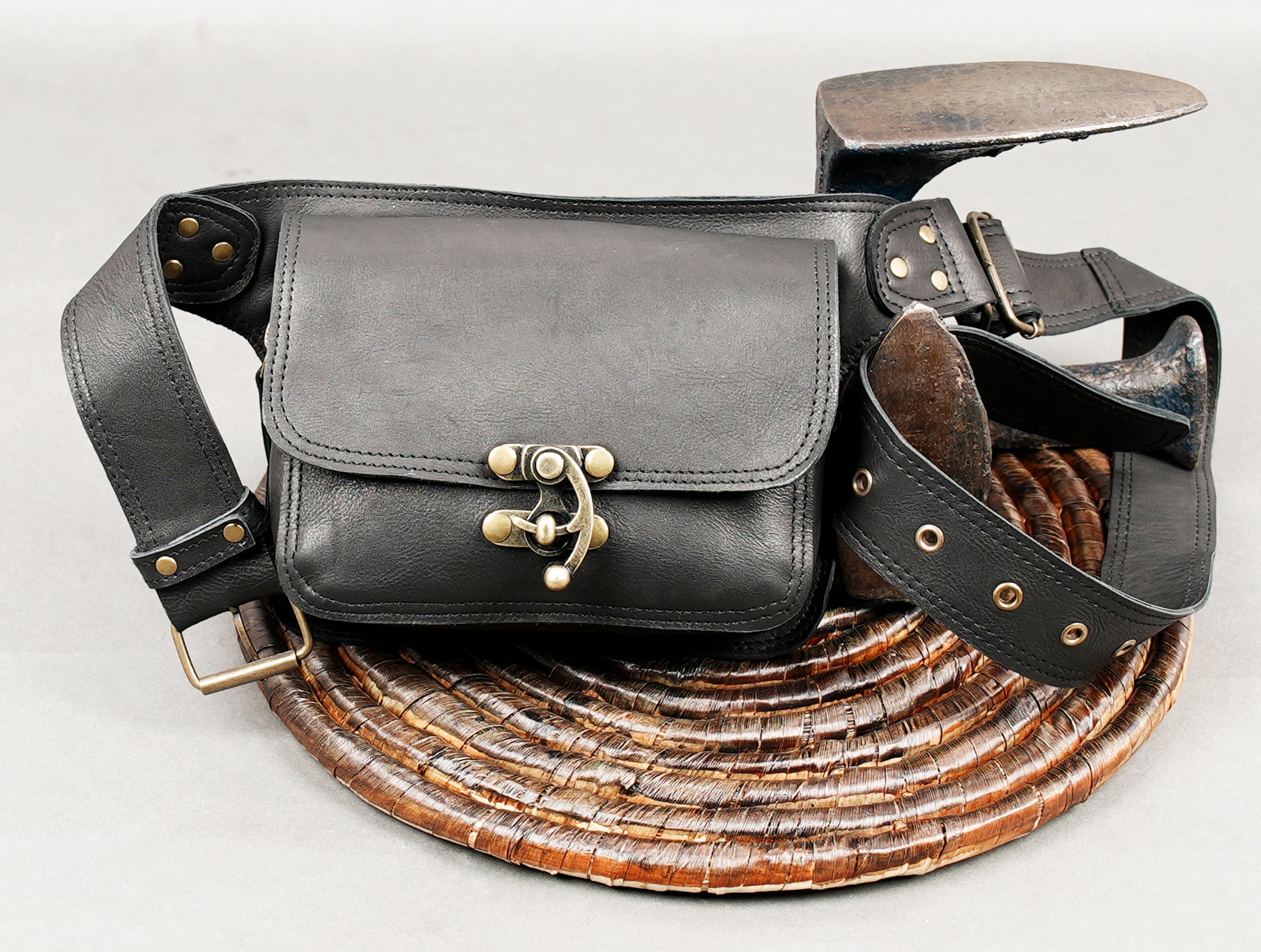 Black handcrafted leather hip pouch with front flap