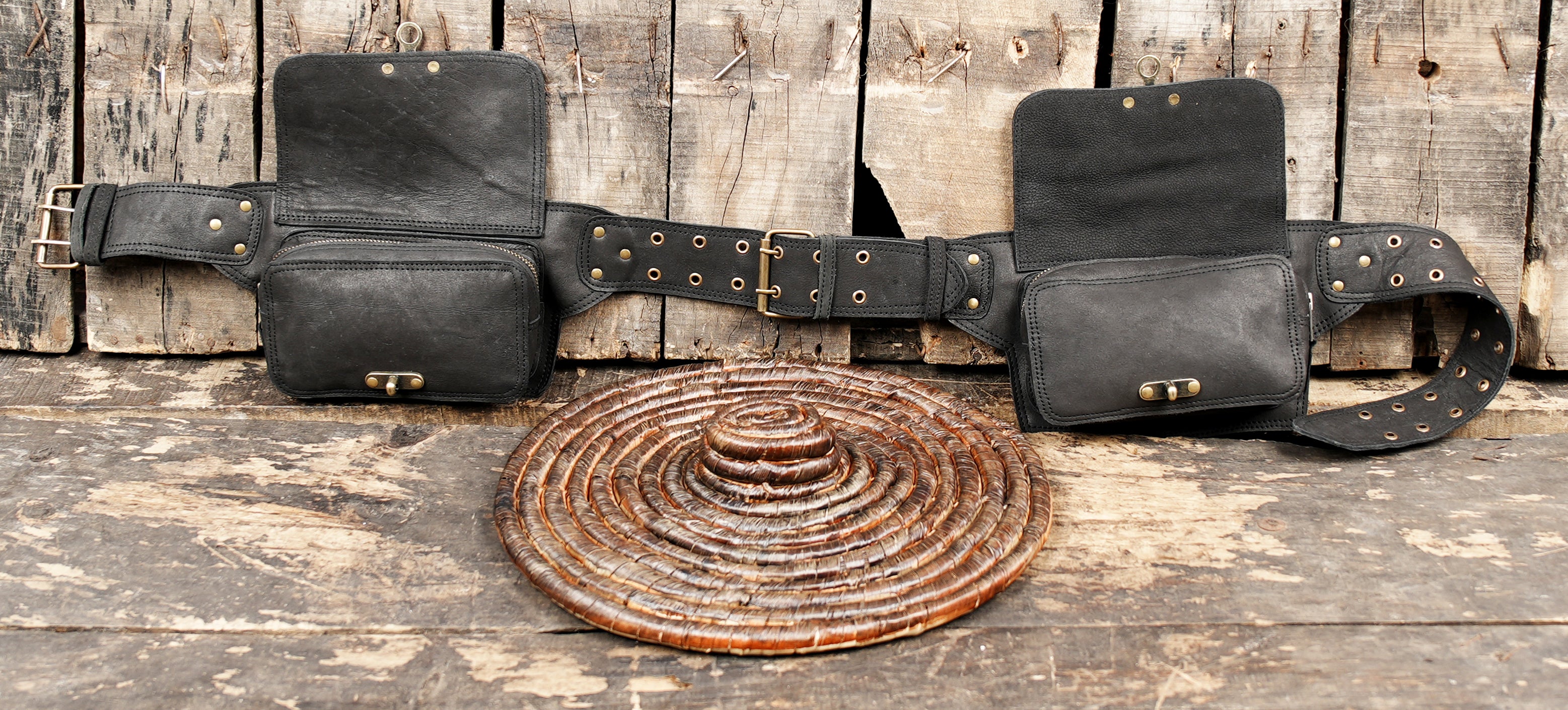 Multi-pocket leather hip belt for travel and outdoor use