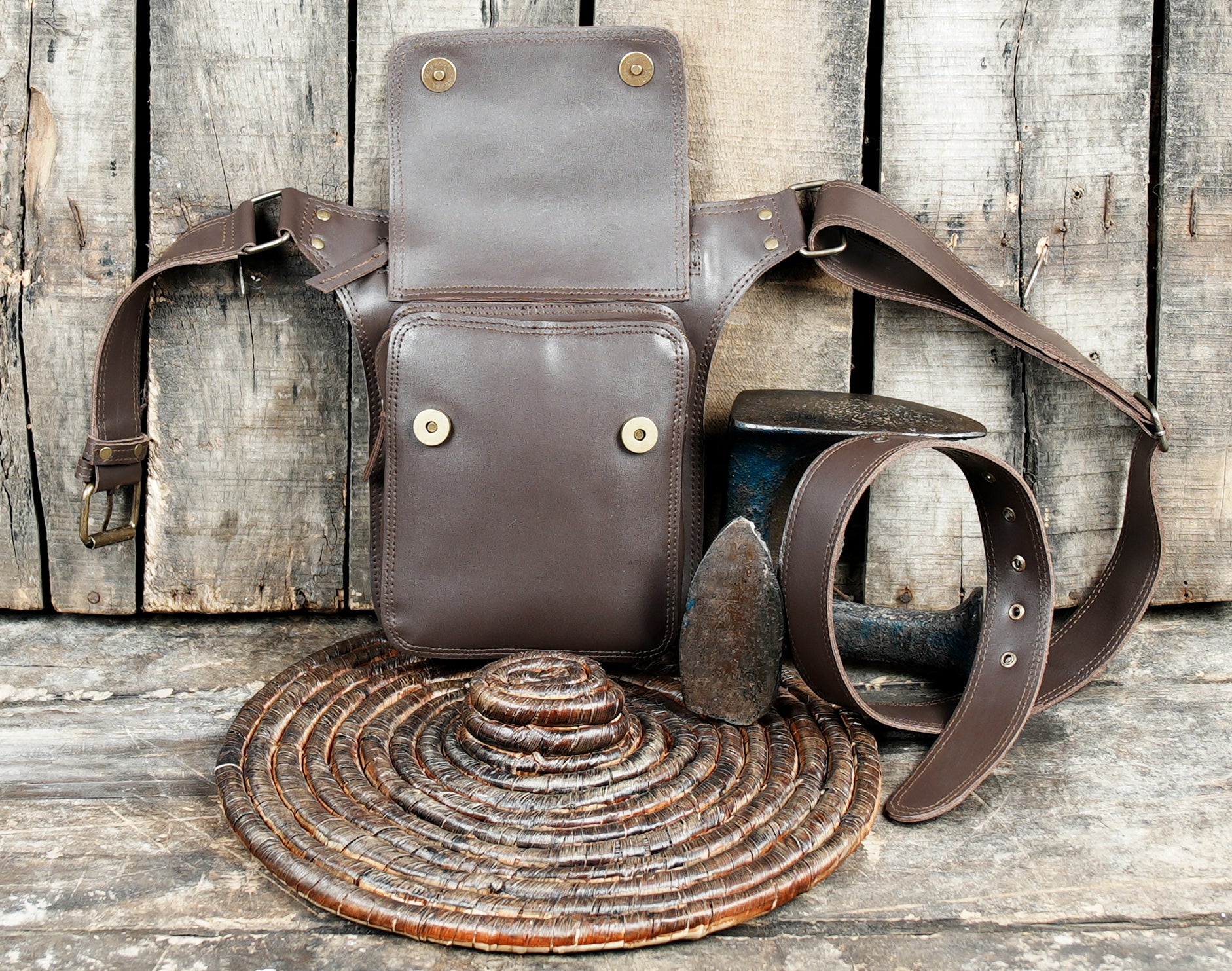 Rustic leather adventure belt with functional storage pocket