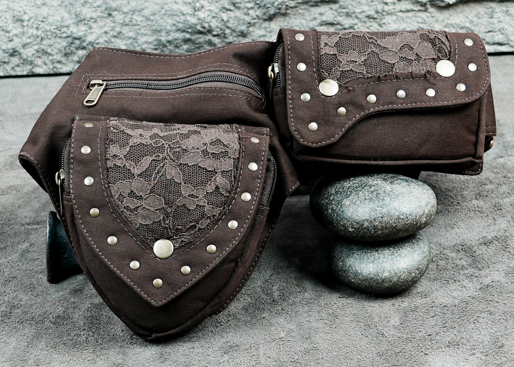 Brown cotton waist bag with lace-covered flaps and snap button closure