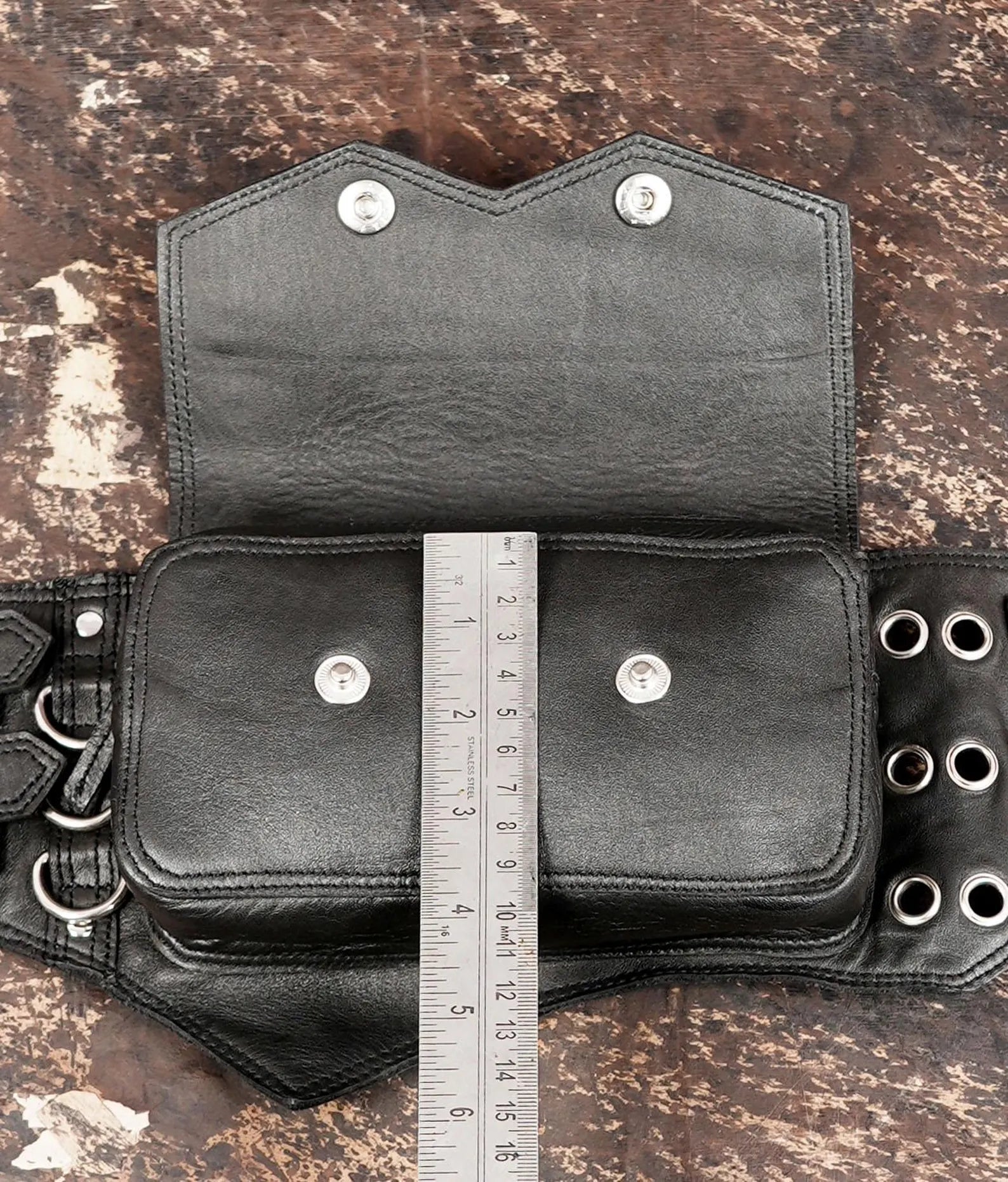 Utility leather belt bag with durable straps and snap pockets