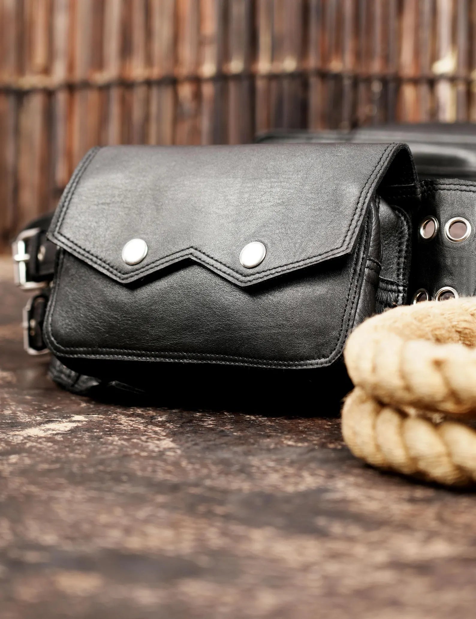 Adjustable black leather belt bag for festival and travel use
