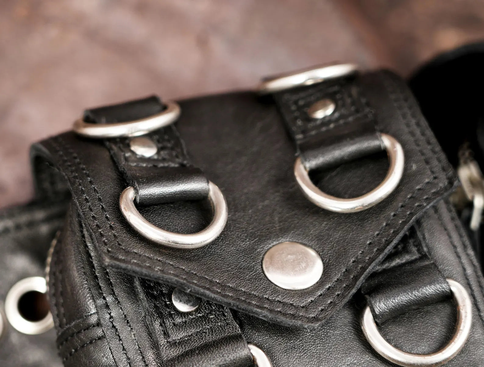 Unisex leather hip belt with utility pouches and metal rings