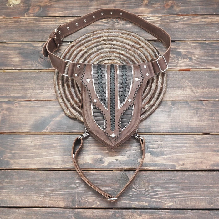 Genuine leather hip and leg belt with tribal pattern design.