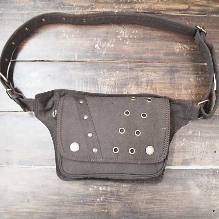 Utility waist pouch with zipper closure and antique brass eyelet accents