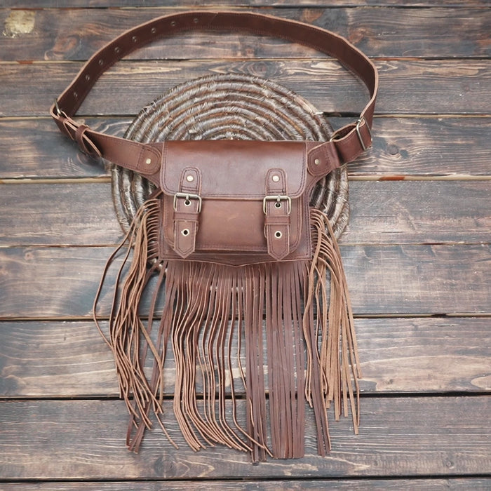 Handmade festival style leather hip pouch with fringe detail