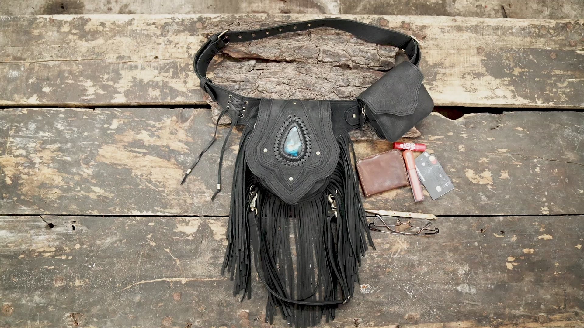 Genuine leather thigh holster with fringe and braided detailing