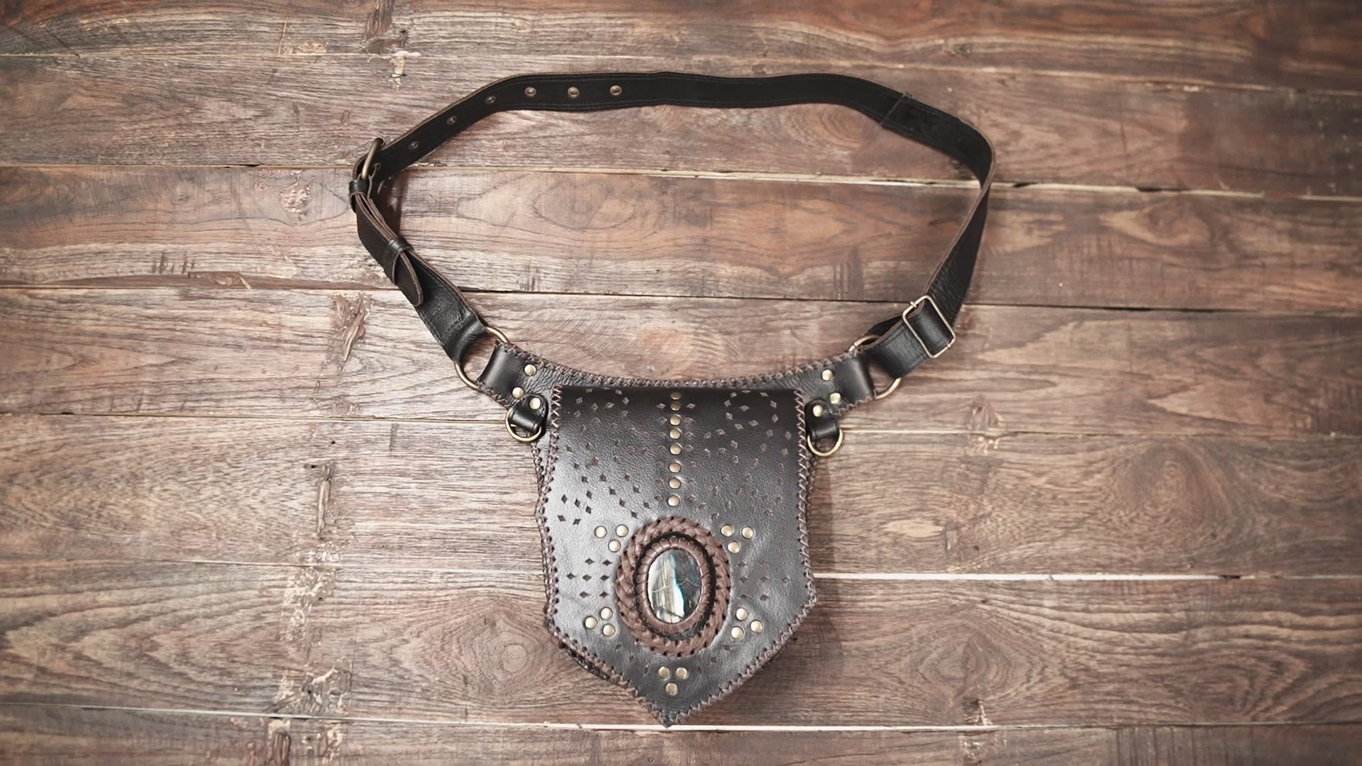 Genuine leather waist belt pouch with teardrop stone centerpiece
