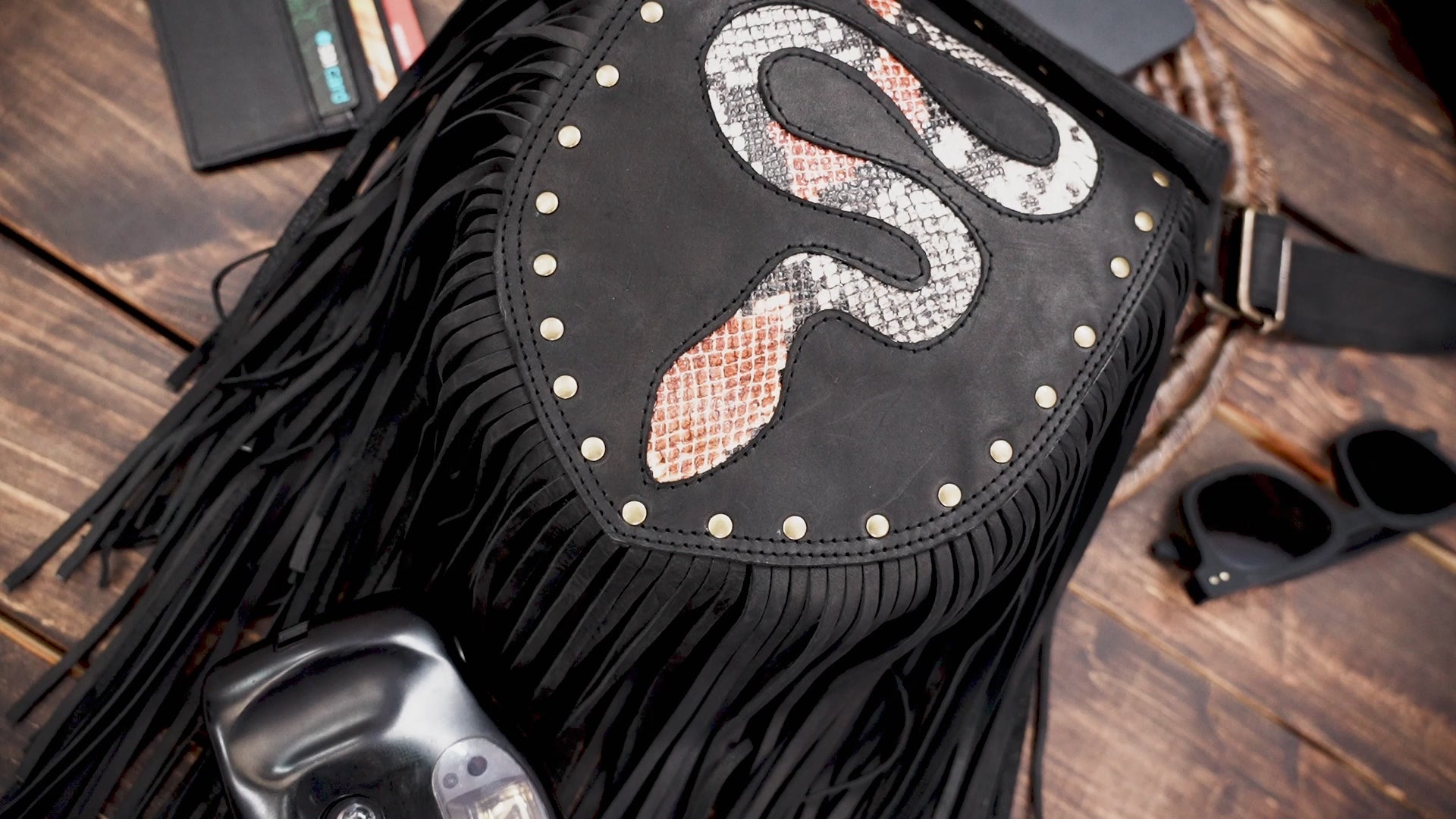 Festival-ready fringe belt bag with reptile-inspired details