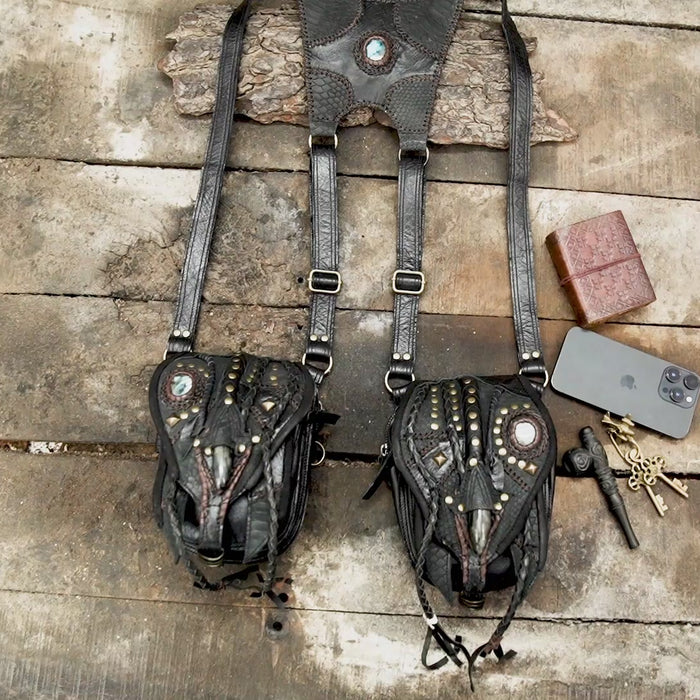 “Artisan dual pouch leather holster with braided details and claw centerpiece”