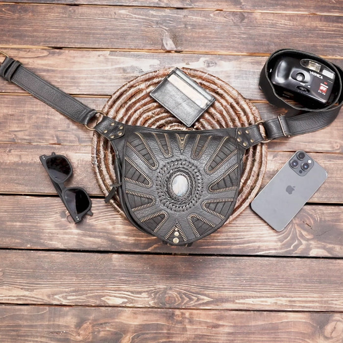 Western-style handcrafted leather waist bag with detailed stitching and stone inlay