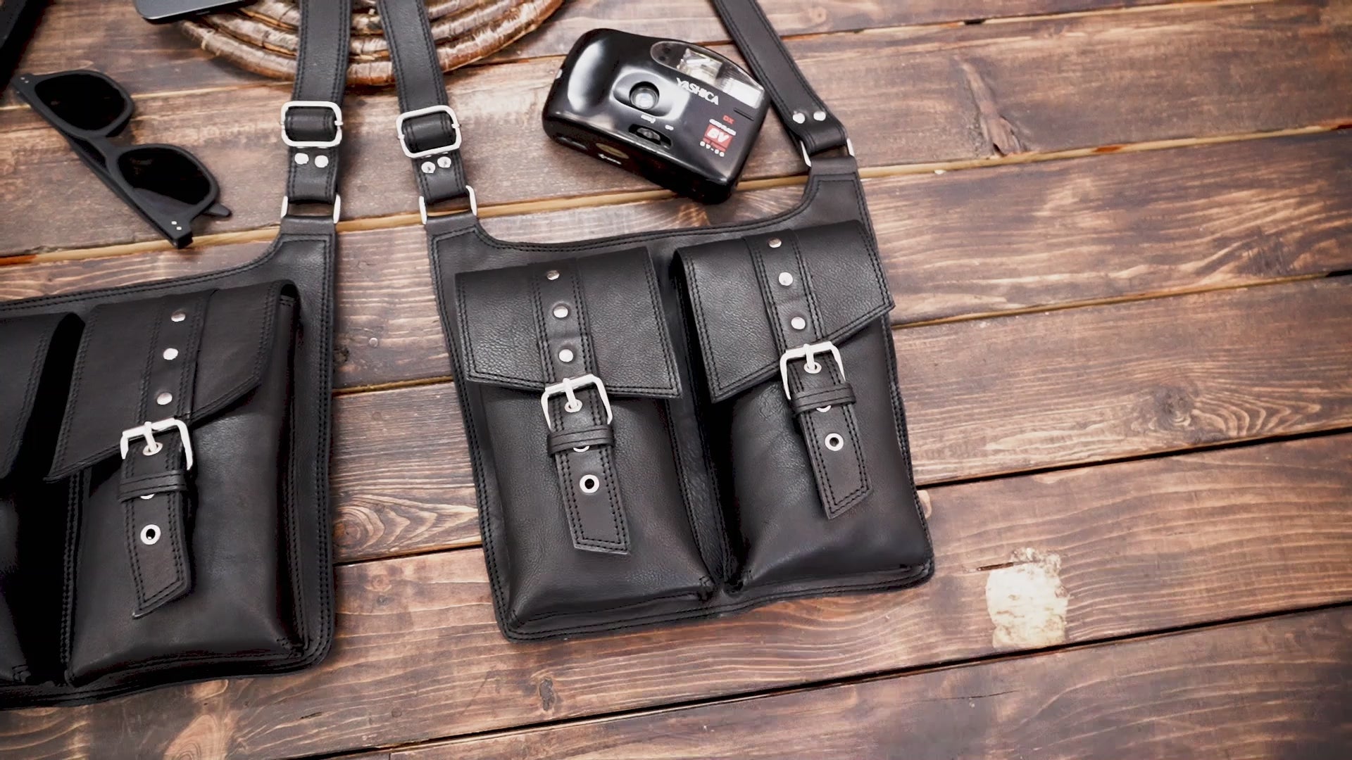 Handmade leather holster bag with twin buckled compartments