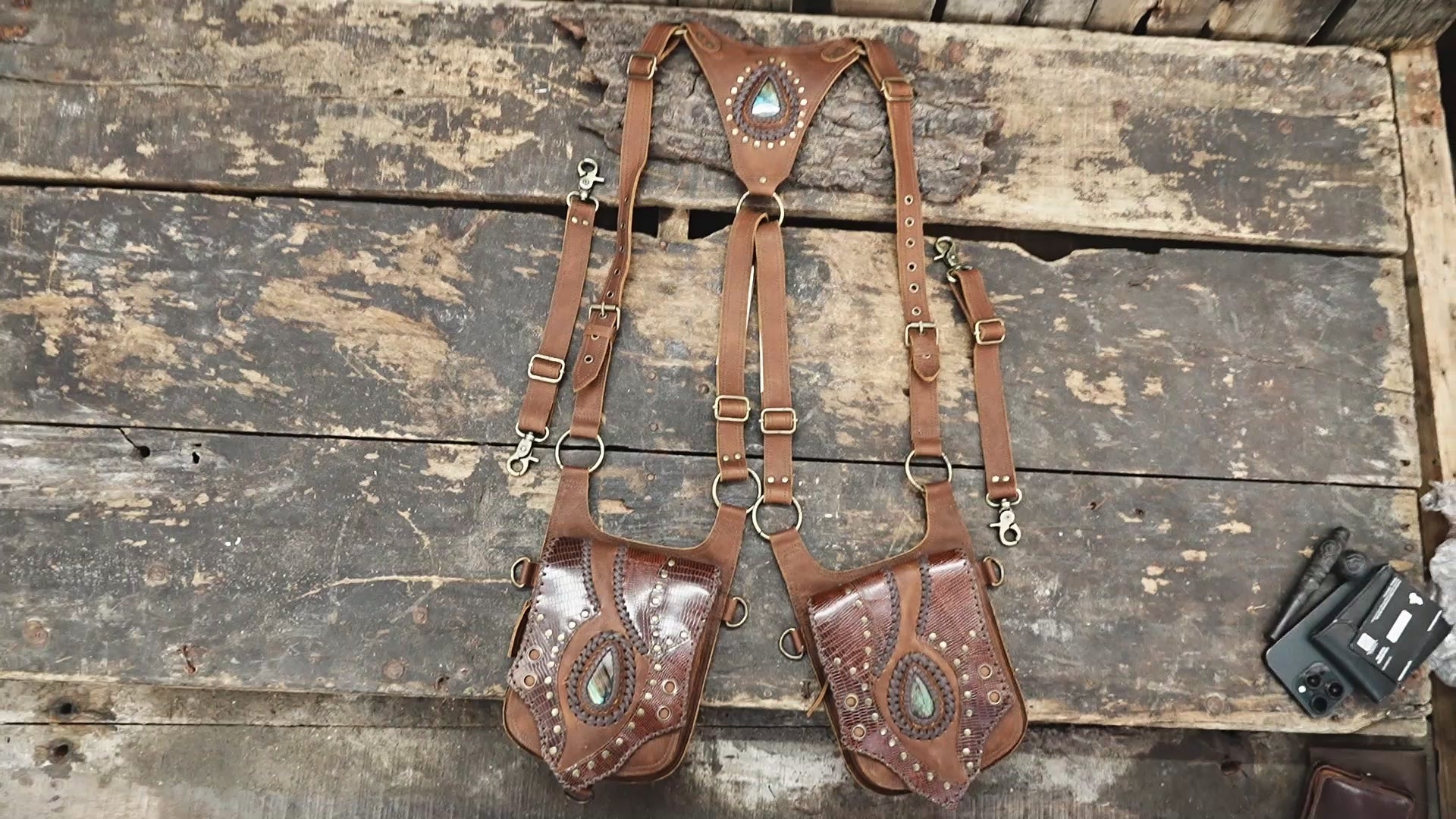 “Artisan leather holster set with gemstone inlay and embossed reptile patterns”