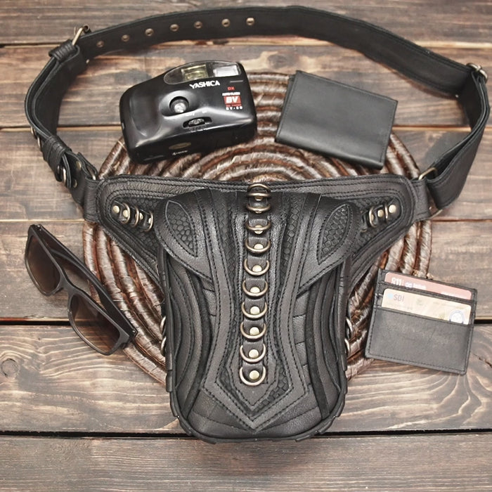 Handcrafted black leather hip belt with metal ring detailing