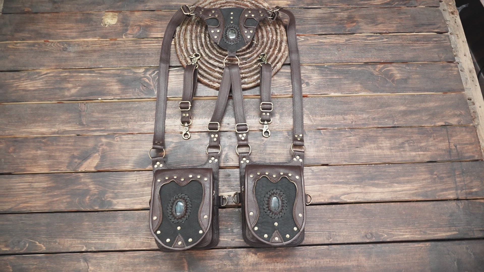 Luxury artisan leather holster with fantasy aesthetic and strong hardware