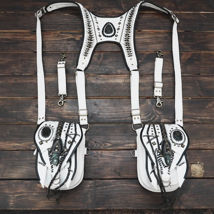 Handmade leather shoulder holster with twin pouches and black detailing