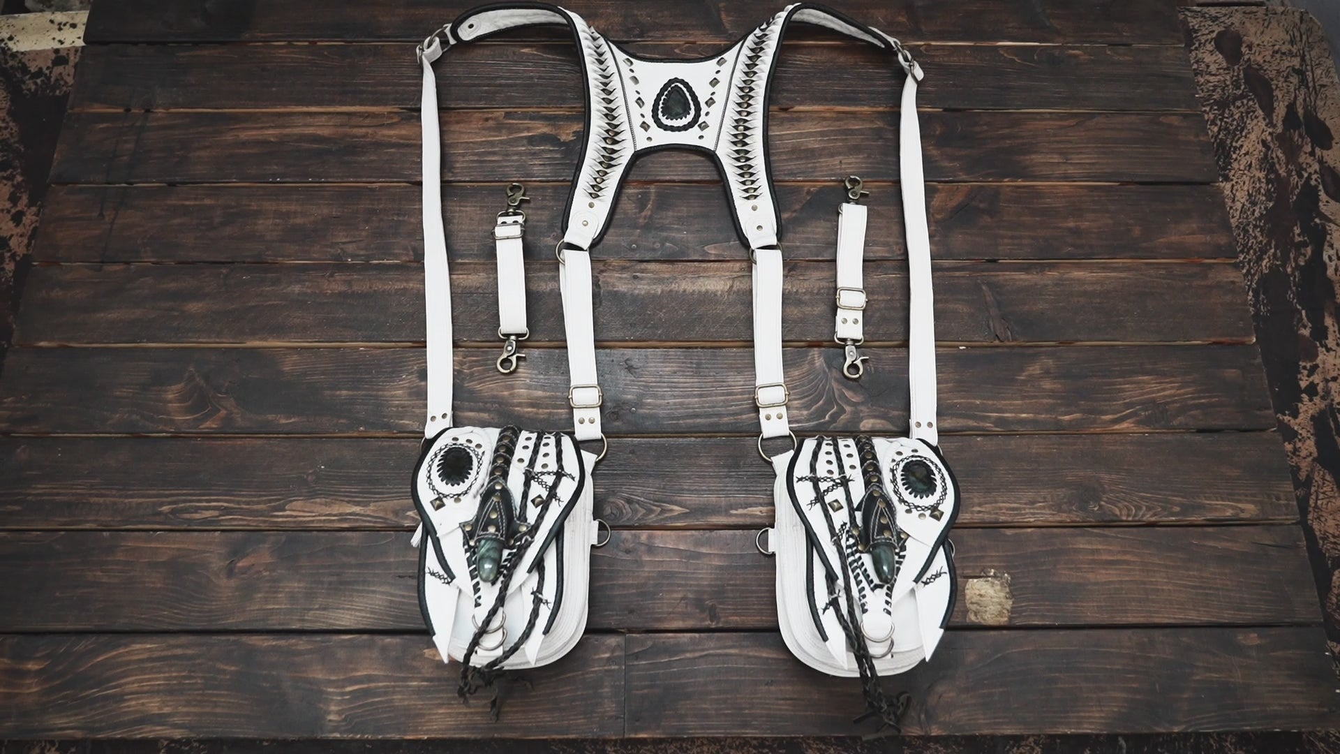 Handmade leather shoulder holster with twin pouches and black detailing