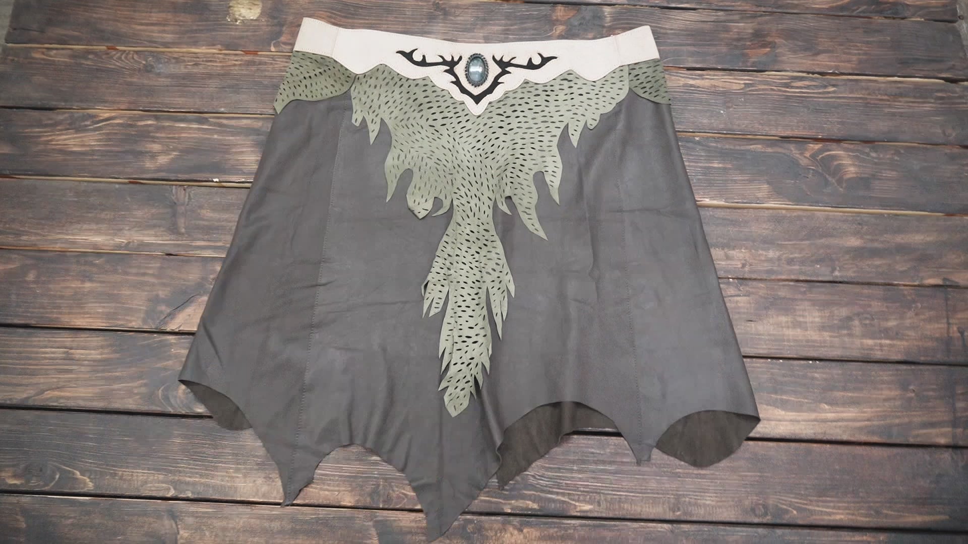 Brown leather skirt with artistic cutwork hem