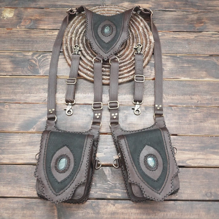 Fantasy style leather body holster with adjustable straps and gemstone detail