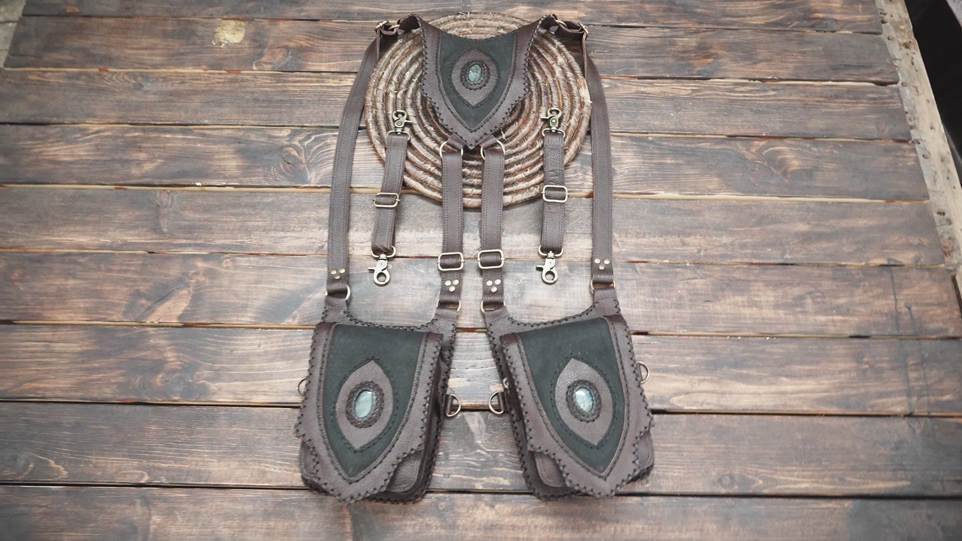 Fantasy style leather body holster with adjustable straps and gemstone detail