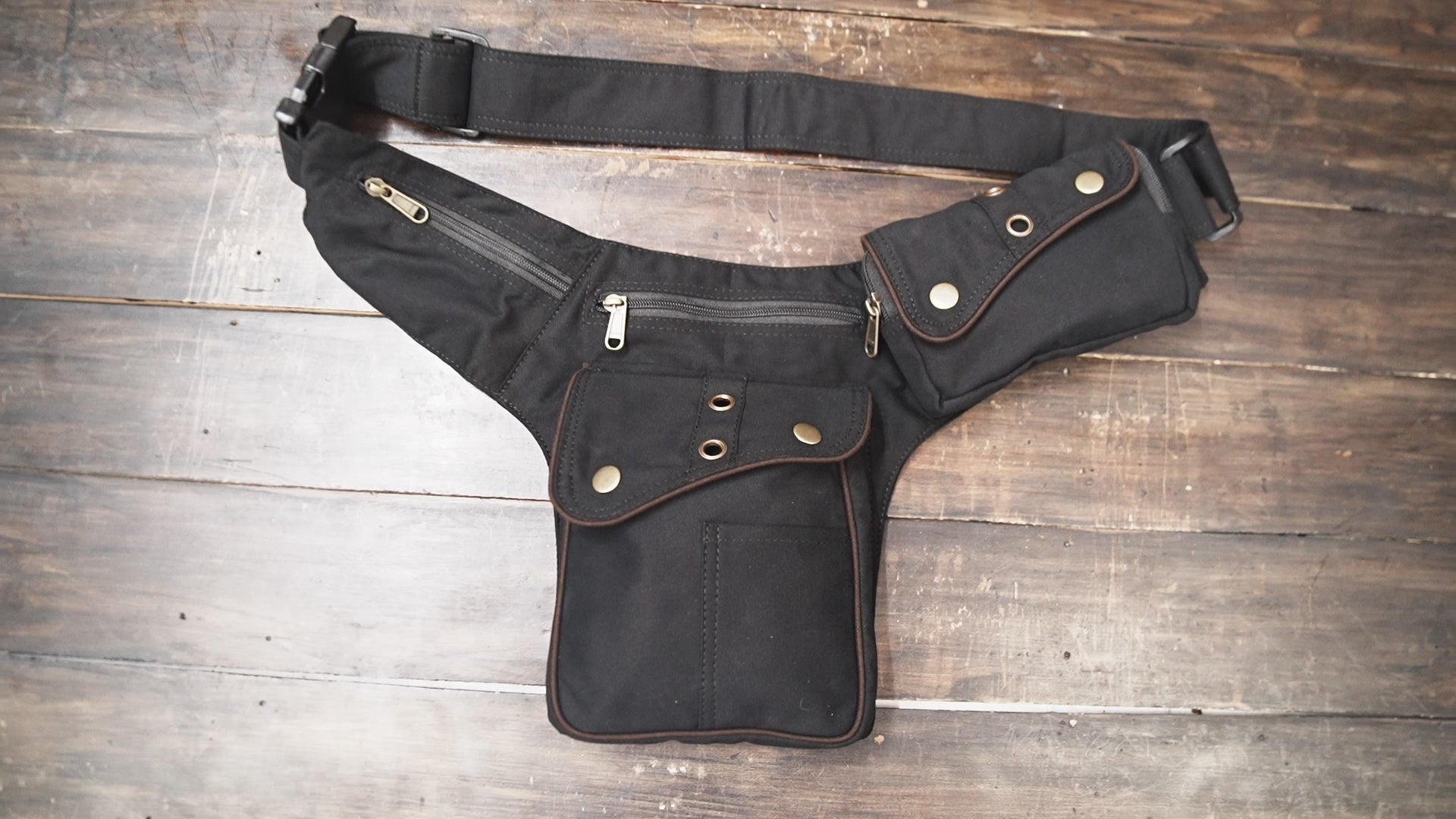 Adjustable black festival belt bag with cargo storage pockets